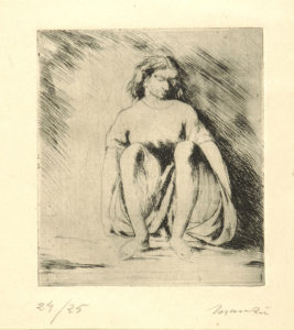 Donna accovacciata